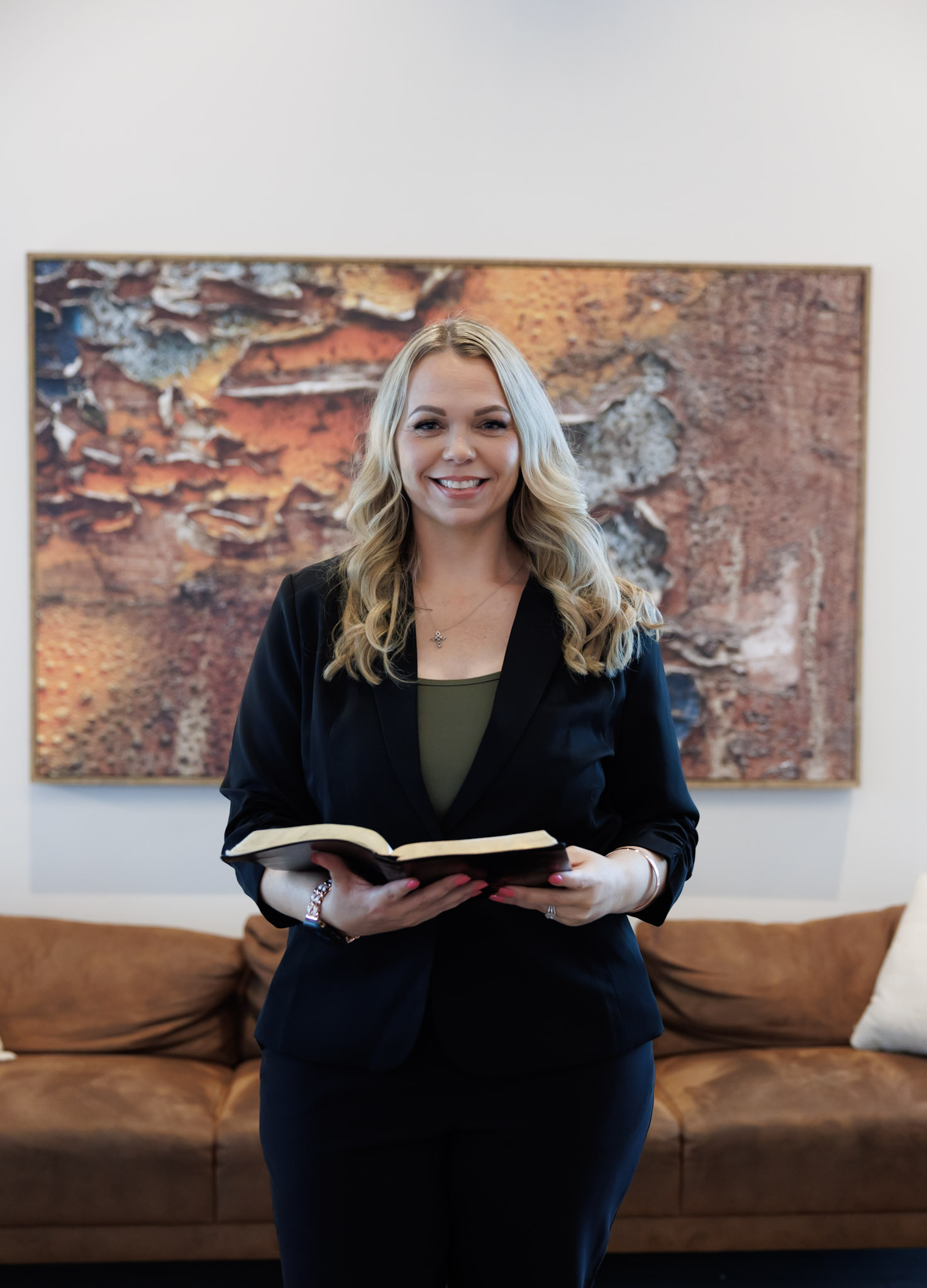 Miranda Stewart holding her open Bible